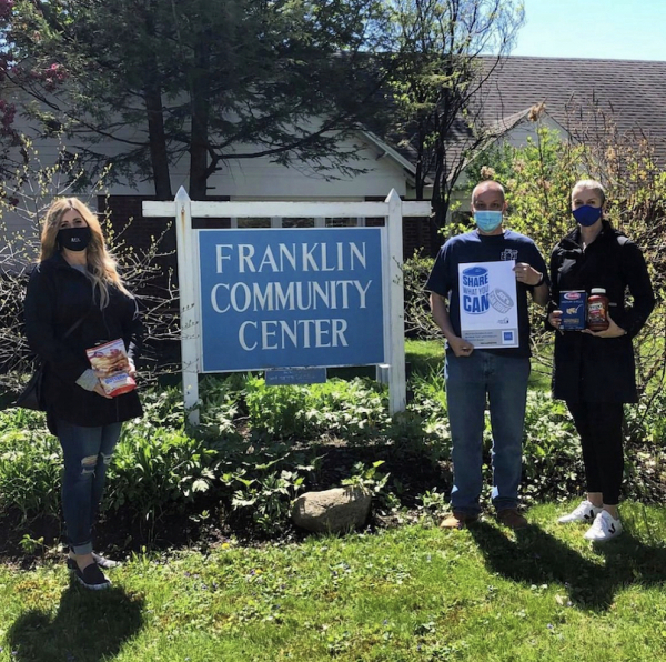 Members of the SIX Marketing team participating in their April “Share What You CAN” can drive to benefit Franklin Community Center. Photo provided.